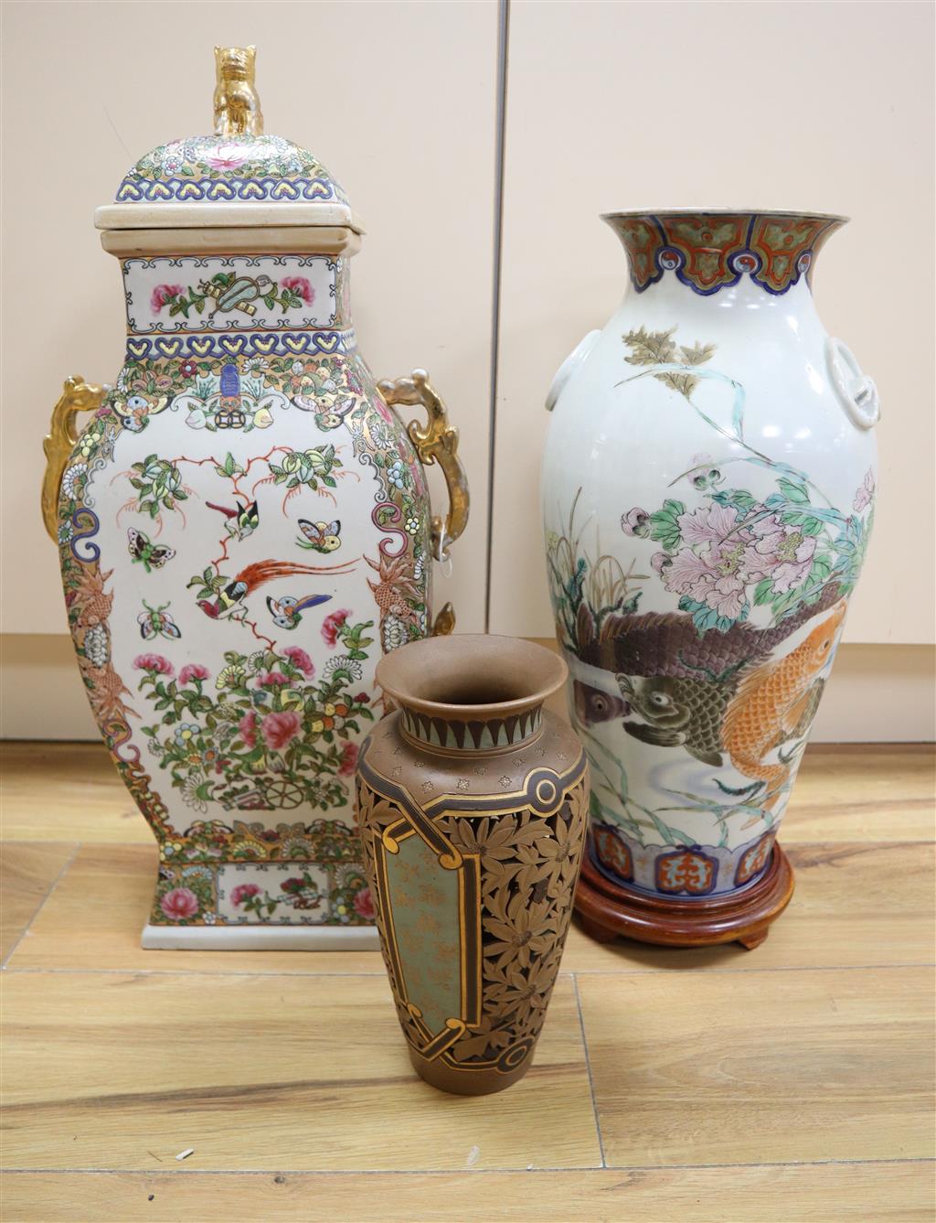 Eliza Simmance -a Doulton reticulated silicon ware vase, a Chinese lidded vase, a Japanese fish decorated vase, 59cm